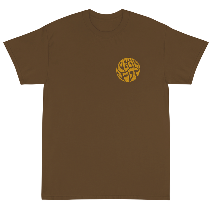Peach Pit brown short sleeve tee with circular Peach Pit logo on front and rolling design on the back